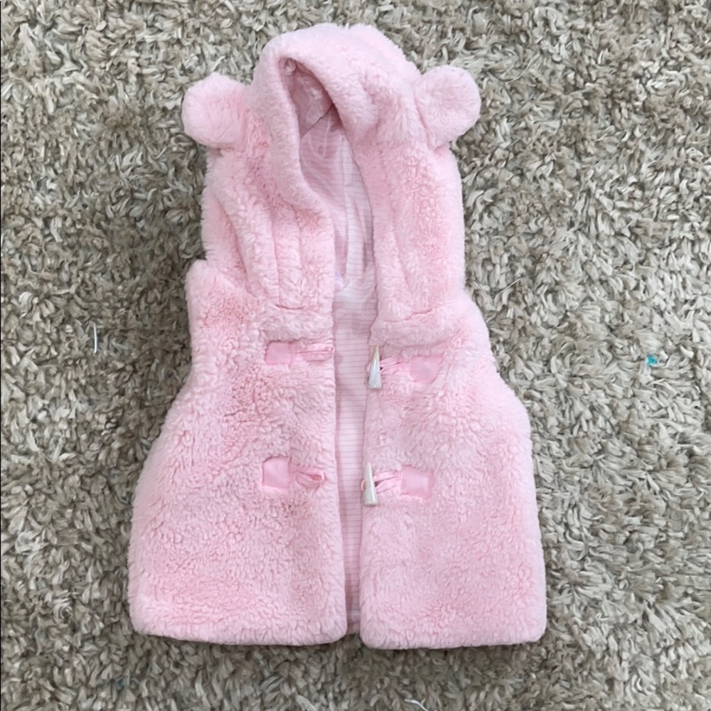 Pink fur vest with bear ears on hood